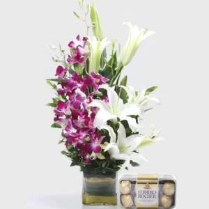 Orchid_N_Lilies_Arrangement_with_Chocolates__63577.1631202418